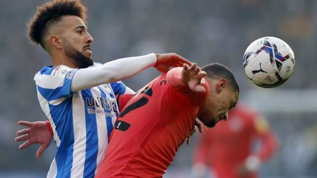 Swans fight back for Huddersfield draw